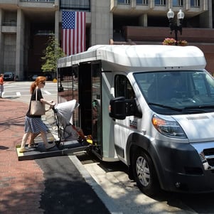 Picking up mother and children city.crop